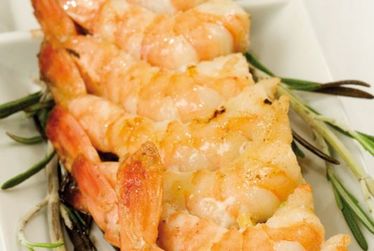 Brocheta de langostinos